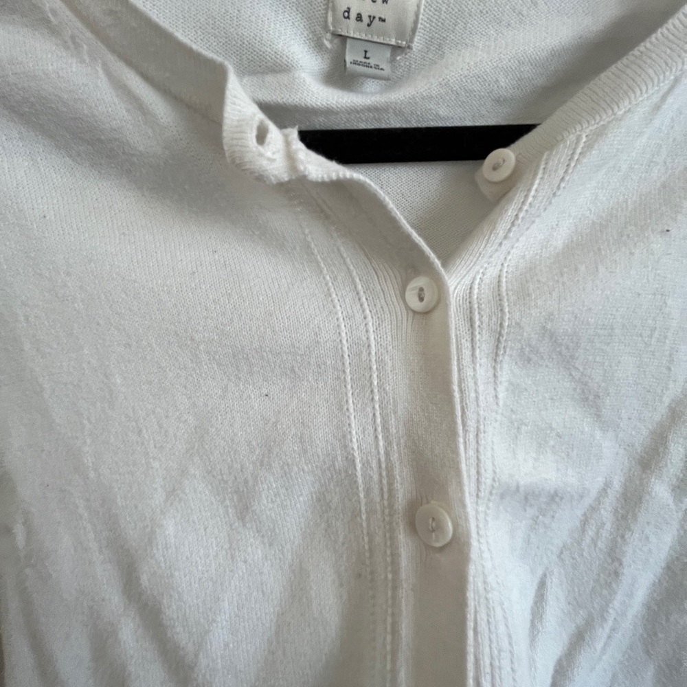 White cardigan sweater